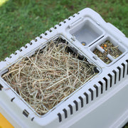 Image of hay, water, and food dispenser for the Kerbl Rabbit Burrowing Base 